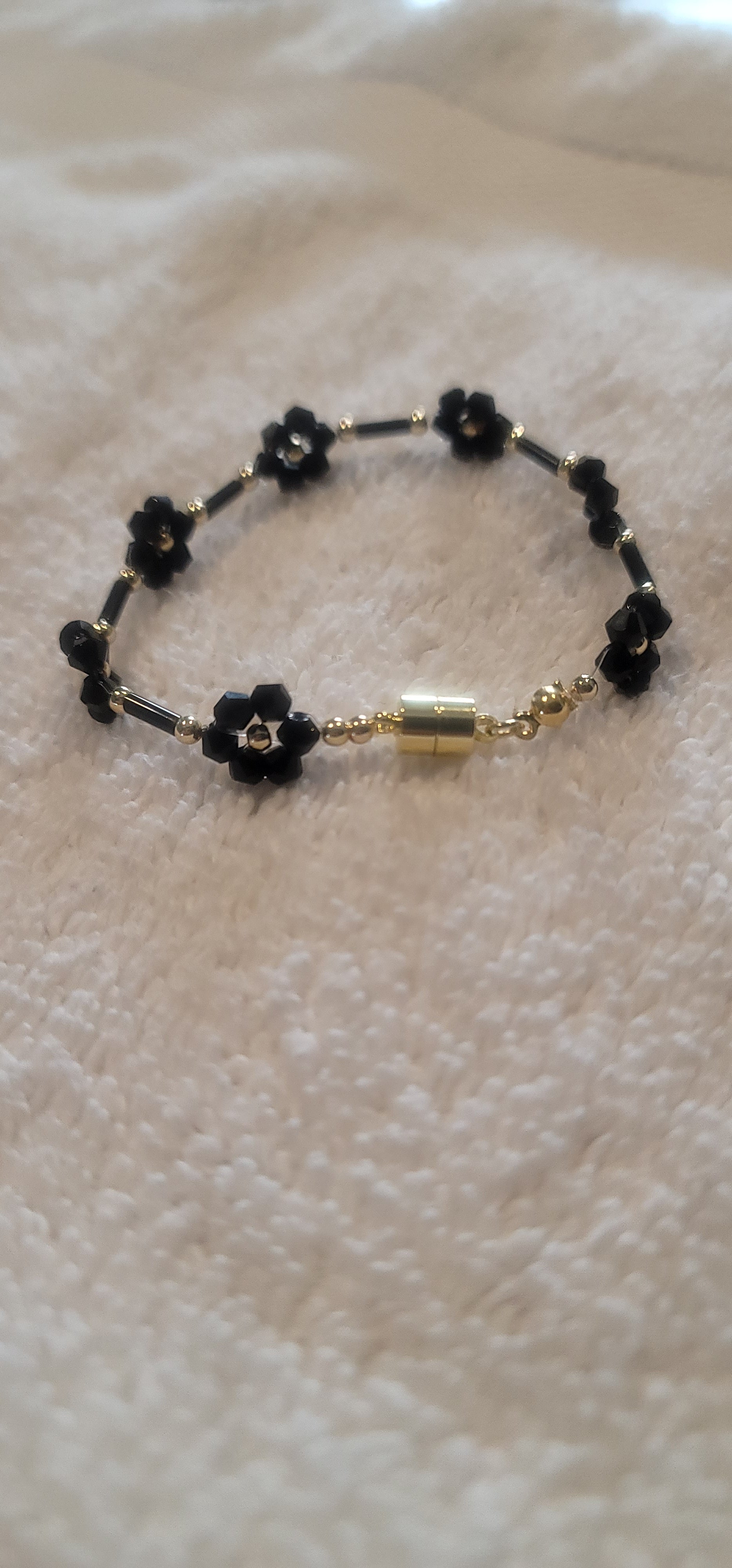 Blumenarmband