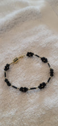 Blumenarmband