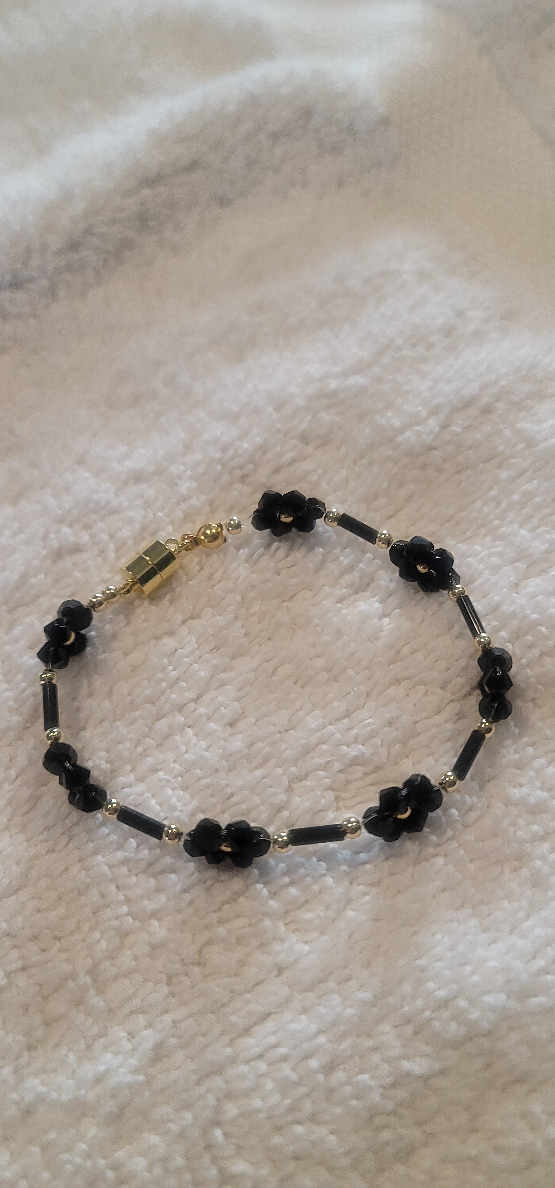 Blumenarmband